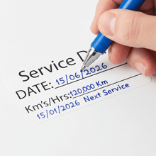 Load image into Gallery viewer, Close-up of sticker with hand physically writing date in ballpoint pen