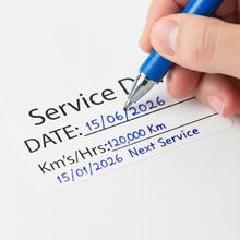 Load image into Gallery viewer, Close-up of sticker with hand physically writing date in ballpoint pen