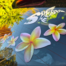 Load image into Gallery viewer, Floral yellow frangipani stickers on a car window with a brand logo in the background