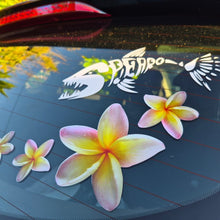 Load image into Gallery viewer, Floral yellow frangipani stickers on a car window with a visible brand logo.