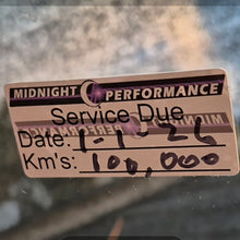 Load image into Gallery viewer, double sided Service due sticker on a car window with 'Midnight Performance' branding