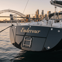 Load image into Gallery viewer, Endeavour - black yacht Sydney Harbour gold decal