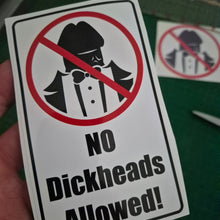 Load image into Gallery viewer, Sticker with 'No Dickheads Allowed!' text and a prohibition symbol on a green background