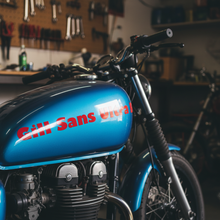 Load image into Gallery viewer, Gill Sans on motorbike