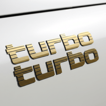 Load image into Gallery viewer, Gold Turbo sticker close-up white LandCruiser