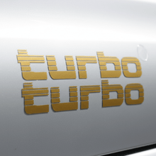 Load image into Gallery viewer, Gold Turbo sticker low angle sunlight