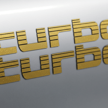 Load image into Gallery viewer, Gold Turbo sticker macro silver panel