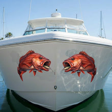 Load image into Gallery viewer, White boat with mangrove jack fish decals on a dock with palm trees in the background