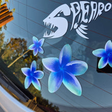 Load image into Gallery viewer, Frangipani Blue flower decals on a car window with a shark decal above them.