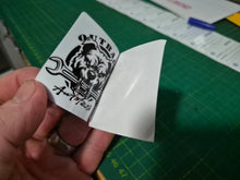 Load image into Gallery viewer, Close-up of double-sided 50x50mm service due sticker showing custom business logo and service reminder details