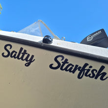 Load image into Gallery viewer, custom Boat name with 'Salty Starfish' decal on a clear day