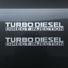 Load image into Gallery viewer, Satin silver-grey Turbo Diesel Direct Injection stickers doubled on dark background