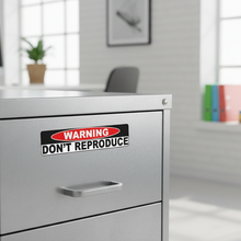 Load image into Gallery viewer, Sticker on filing cabinet
