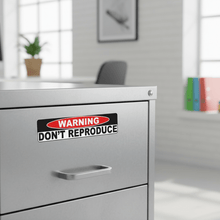 Load image into Gallery viewer, Sticker on filing cabinet