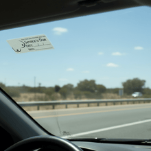 Load image into Gallery viewer, Sticker on windscreen driver POV highway
