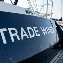 Load image into Gallery viewer, Trade Wind - navy hull close-up white block letters