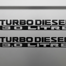 Load image into Gallery viewer, Two black Turbo Diesel 3.0 Litre stickers stacked