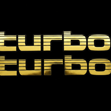 Load image into Gallery viewer, Two gold Turbo stickers flat lay black background