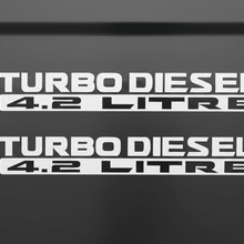 Load image into Gallery viewer, Two white Turbo Diesel 4.2 Litre stickers stacked