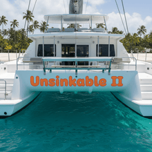 Load image into Gallery viewer, Unsinkable II - catamaran turquoise anchorage