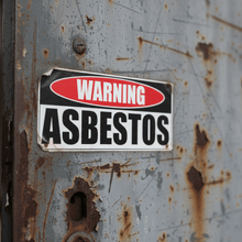 Load image into Gallery viewer, Warning Asbestos close-up on metal door