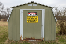 Load image into Gallery viewer, warning do not enter decal On garage/shed door