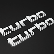 Load image into Gallery viewer, White 100 Series Turbo stickers angled overhead black background