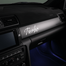 Load image into Gallery viewer, White Gothic Turbo sticker on JDM car interior dashboard trim