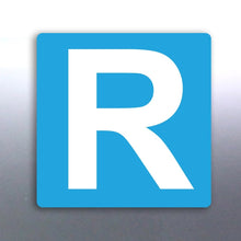 Load image into Gallery viewer, A blue rectangular magnet with the letter 'R' in the center, representing a magnetic badge for drivers with a suspended license.