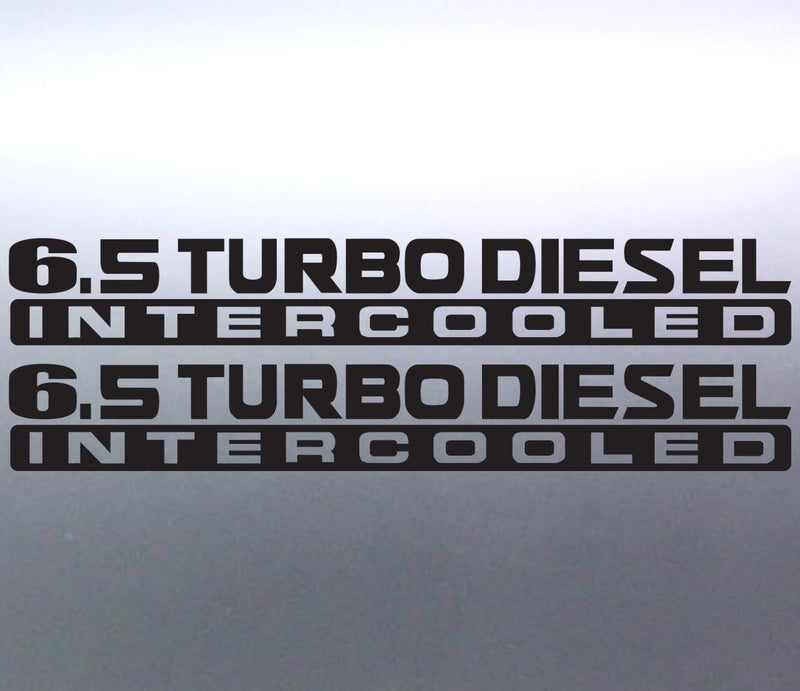 two black vinyl decals with the text '6.5 TURBO DIESEL INTERCOOLED' stacked vertically, shown on a gray metallic surface.