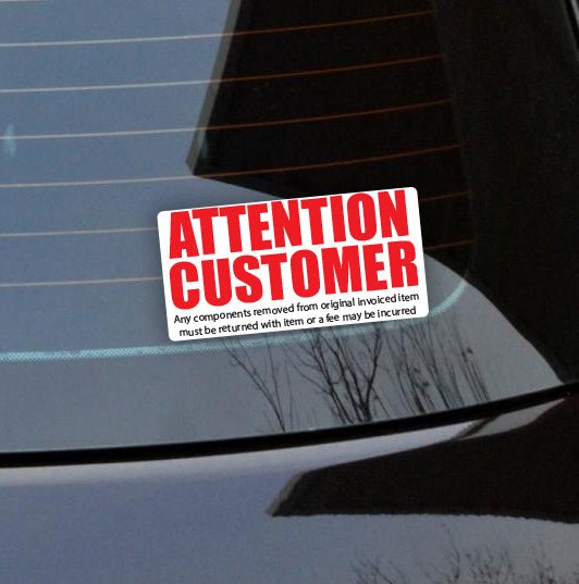 A vinyl sticker with the text 'ATTENTION CUSTOMER' in bold red and black colors, indicating a return policy or instruction.