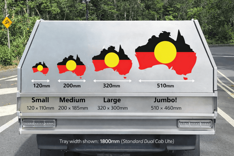 Trailer tray with Aboriginal flag designs and size measurements on a road.