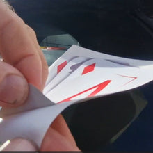 Load image into Gallery viewer, Hand holding playing cards with a blurred background
