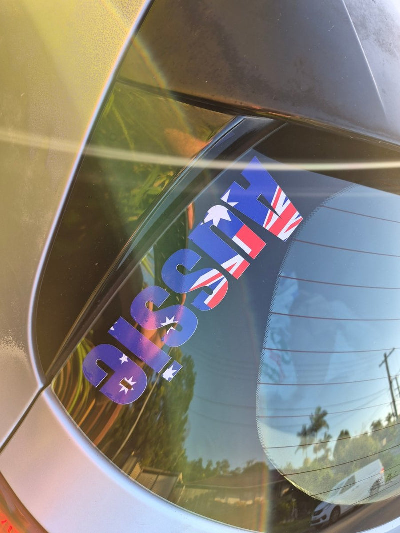 Reflective car surface with 'AUSSIE' text and Australian flag