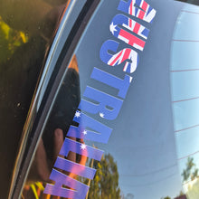 Load image into Gallery viewer, Reflective 'AUSTRALIA' decal with Australian flag colors on a car window.
