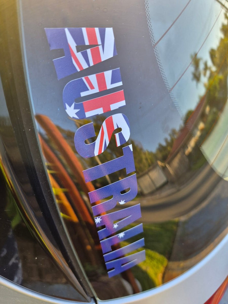 Reflective surface with 'AUSTRALIA' text featuring the Union Jack design.