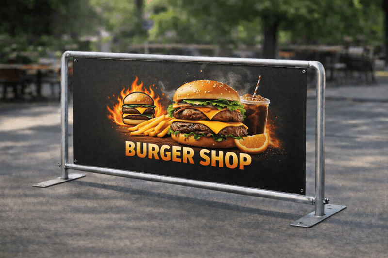 Burger shop sign with a burger, fries, and drink on a dark background