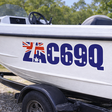Load image into Gallery viewer, White boat with registration number C69Q on a trailer
