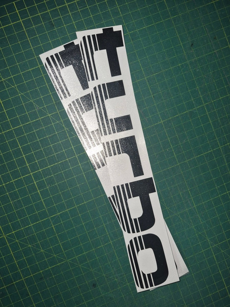 Turbo decal on a green cutting mat