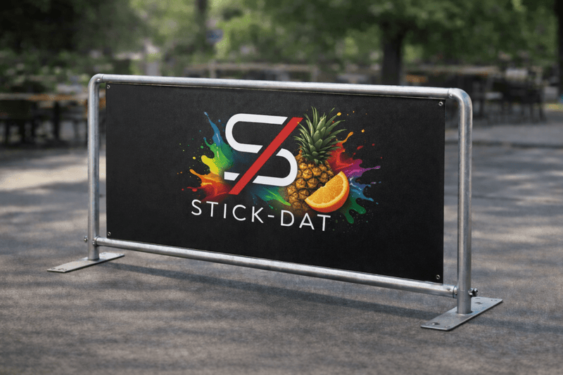 Outdoor setting with a 'Stick-Dat' branded banner featuring colorful graphics.