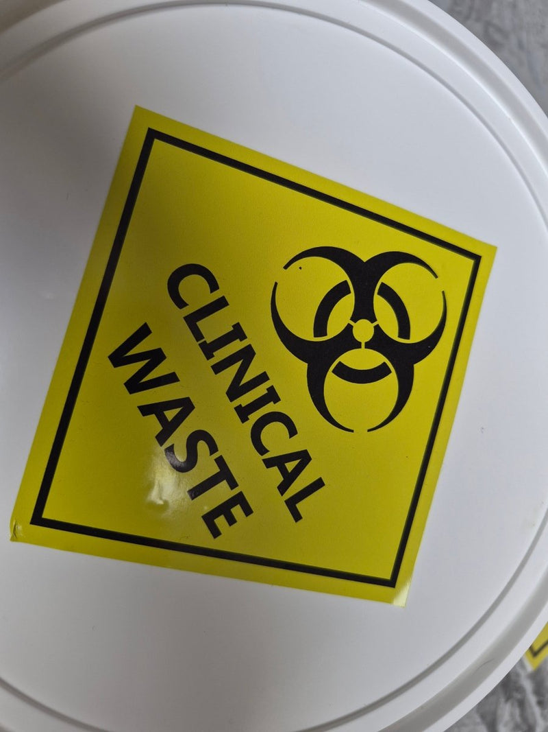 Yellow Clinical Waste sticker on White container