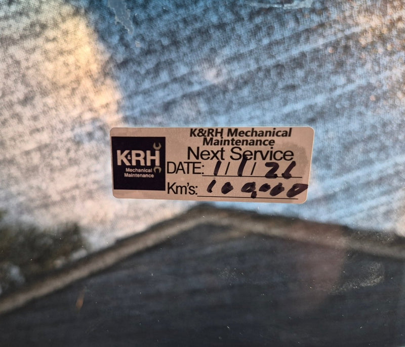 K&RH Mechanical Maintenance sticker on a vehicle with service details.
