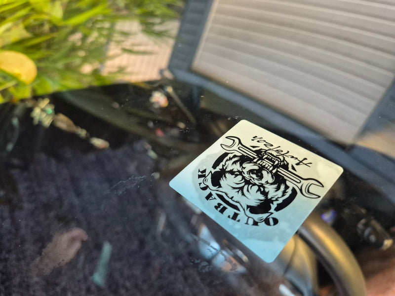 Sticker double-sided service due sticker, seen from the putside of the car window