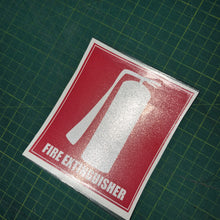Load image into Gallery viewer, Fire extinguisher sign on a green grid background
