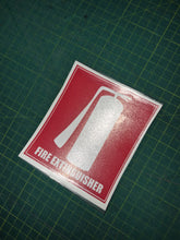 Load image into Gallery viewer, Fire extinguisher sign on a green grid background
