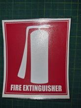 Load image into Gallery viewer, Fire extinguisher sign on a red background with white text and symbol, placed on a green cutting mat.
