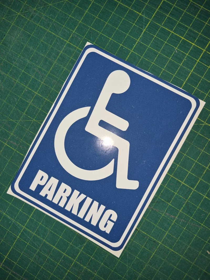 Handicap parking sign on a green grid background