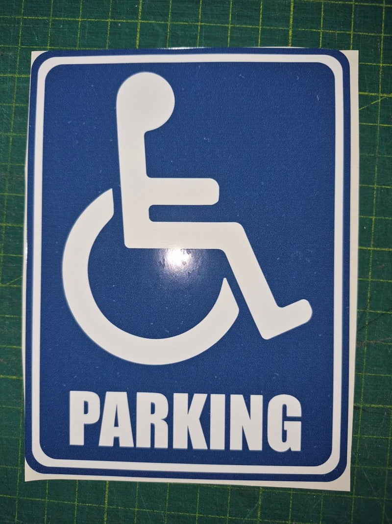 Handicap parking sign on a green grid background decal