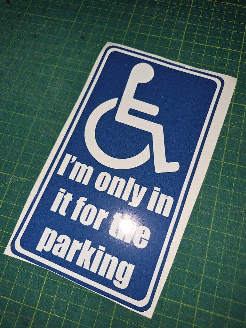 Handicap parking sign with humorous text on a green cutting mat