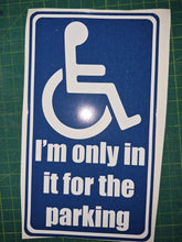 Load image into Gallery viewer, Handicap parking sign with humorous text on a green cutting mat

